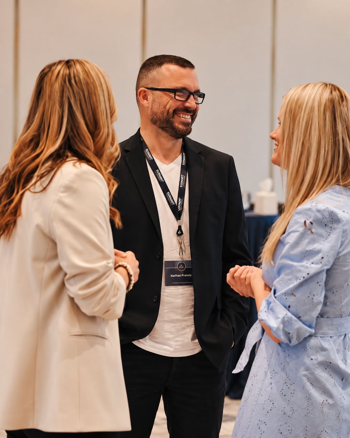 Frenchie® speaking with founders at a business event